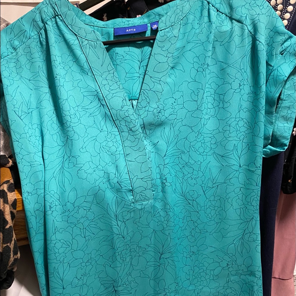 Teal blue short sleeve dress shirt with floral pattern size XS